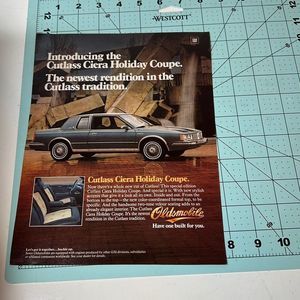 1983 Olds Cutlass Cierra Holiday Coupe Original Print Ad Advertisement